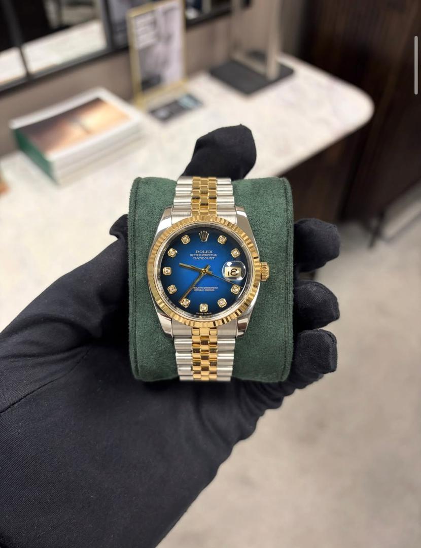 Rolex Datejust 36 watch with blue sunbeam diamond dial