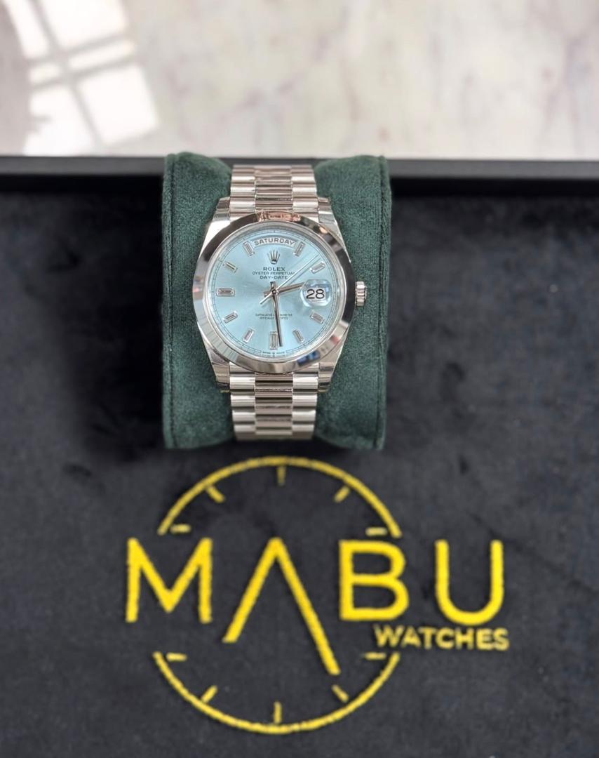 Rolex Day-Date watch with diamond baguette markers